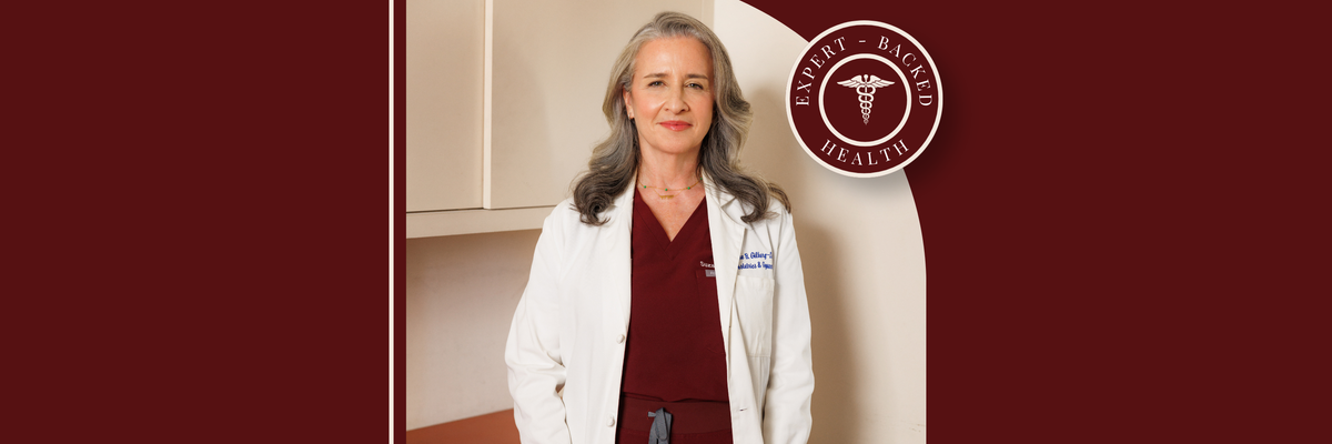 Dr. Suzanne Gilberg in a white coat